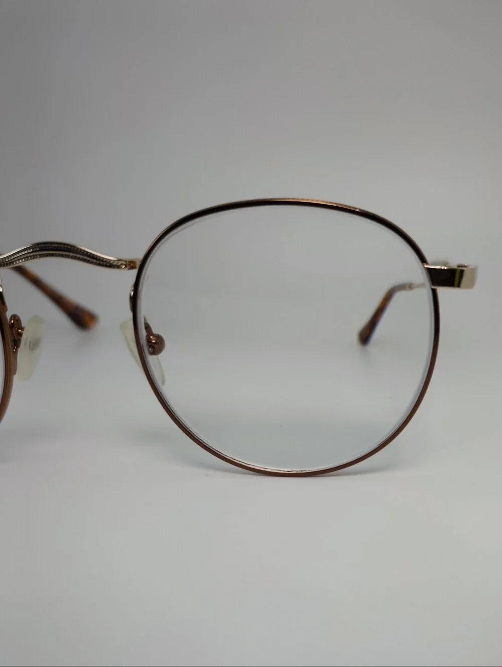 Daydream. Classic Round Metal Frame, Copper Eyewire. Gloss Gold Bridge, Temples.